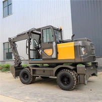 Pelles sur chenilles sur pneus